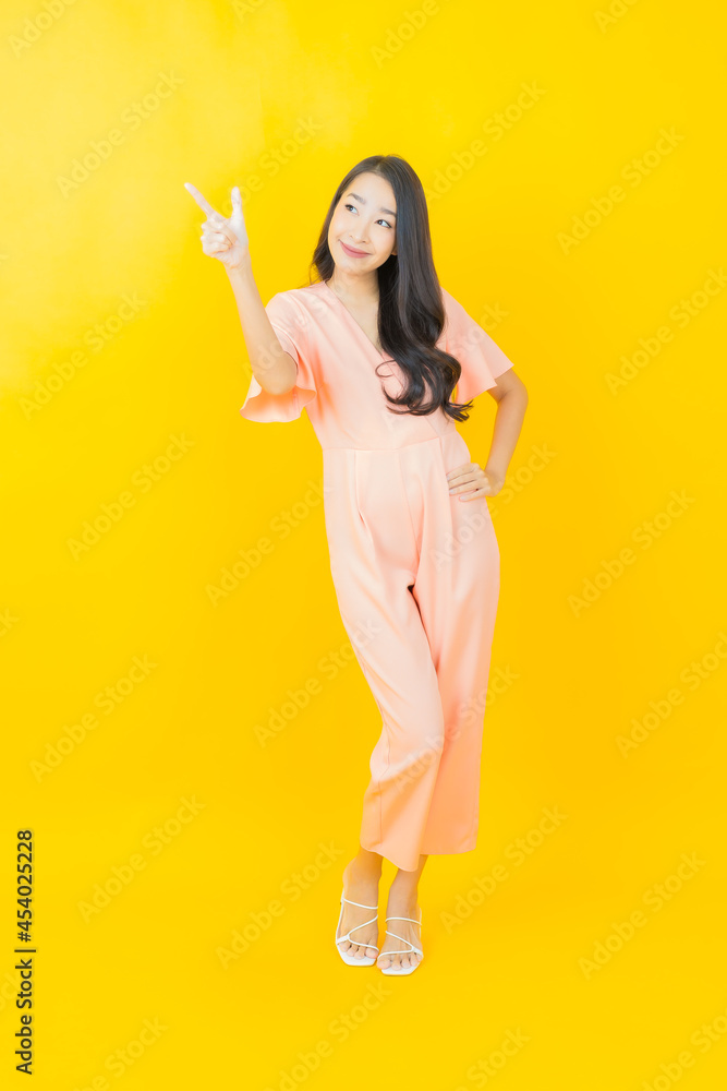 Portrait beautiful young asian woman smile with action Portrait beautiful young asian woman smile with action