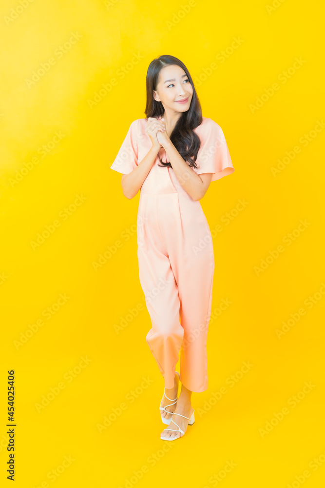 Portrait beautiful young asian woman smile with action Portrait beautiful young asian woman smile with action