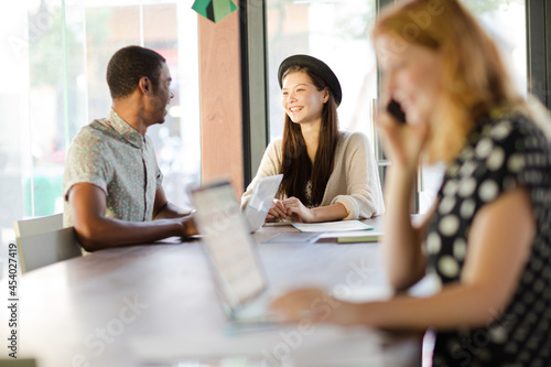 Woman working at conference table in office