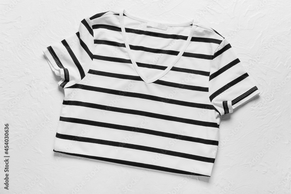Stylish t-shirt on light background Stylish t-shirt on light background