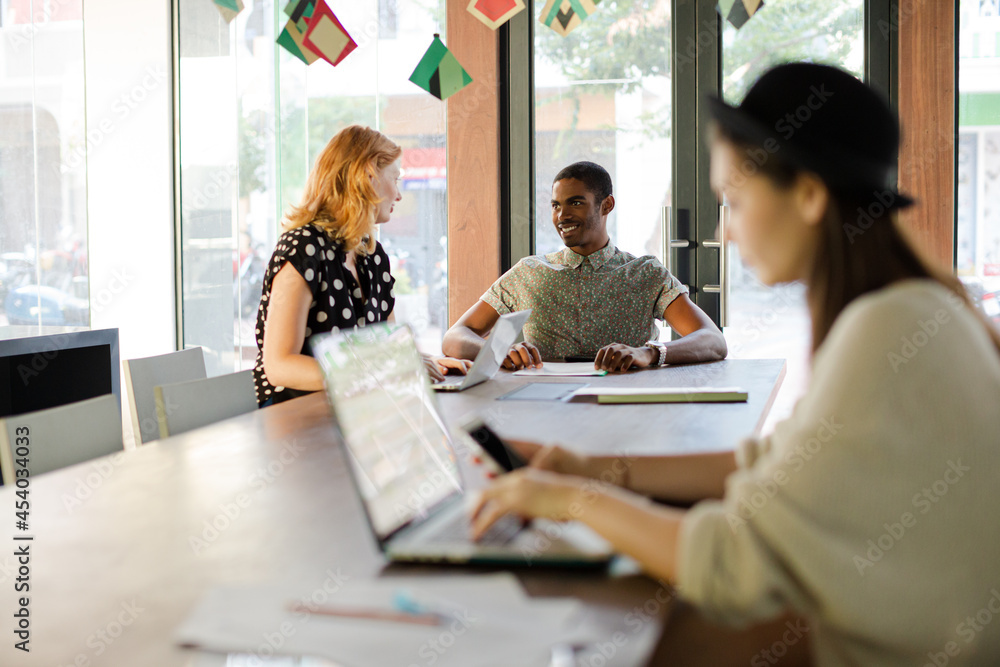 Fototapeta premium People working at conference table in office