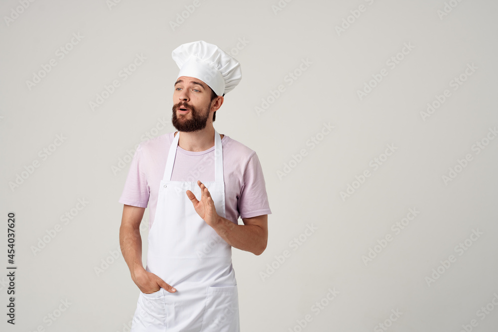 man chef on an apron emotions restaurant Gourmet cooking man chef on an apron emotions restaurant Gourmet cooking
