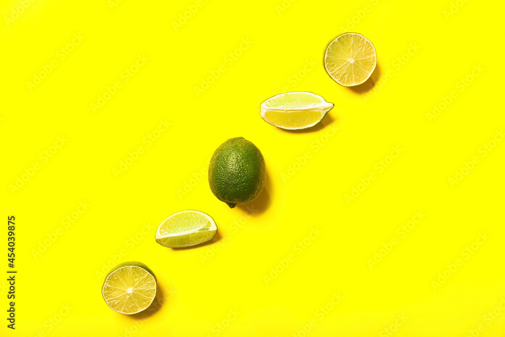 Tasty limes on color background Tasty limes on color background