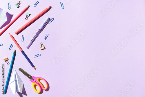 Stationery supplies on color background