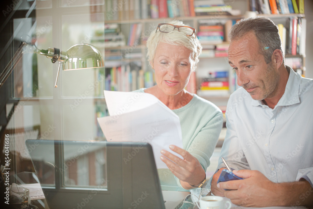 Business people working together at home office desk Business people working together at home office desk