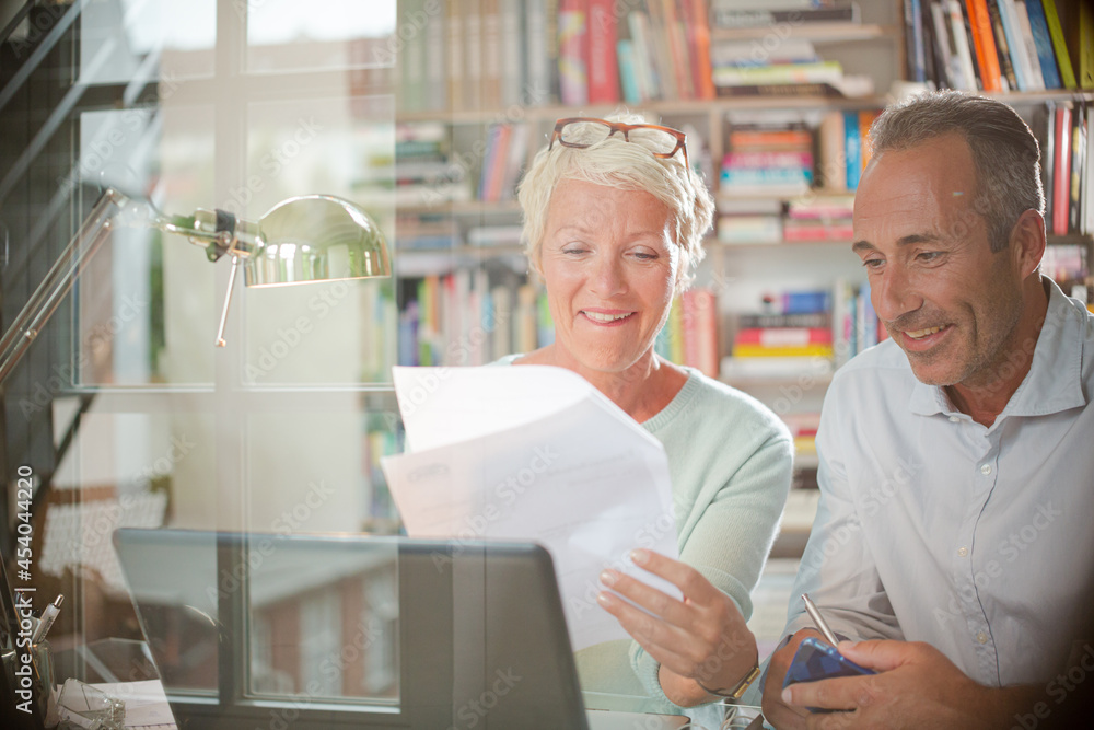 Business people working together at home office desk Business people working together at home office desk
