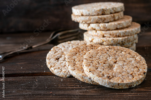 Rice cracker isolated on wooden background photo