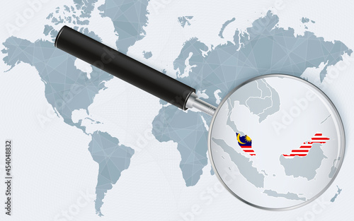 World map with a magnifying glass pointing at Malaysia. Map of Malaysia with the flag in the loop.