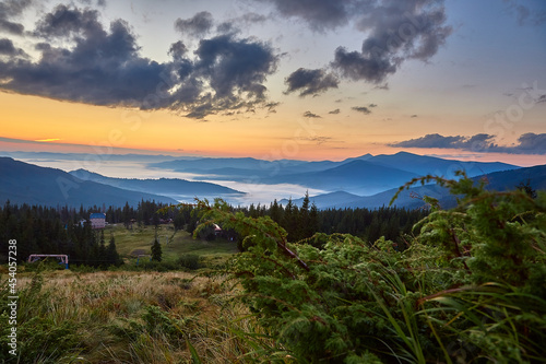Picturesque sunrise in the mountains. The highest ridge of the Ukrainian Carpathians is Chornohora with the peaks of Hoverla and Petros mountains. View from the Svydovets ridge and the Dragobrat ski 