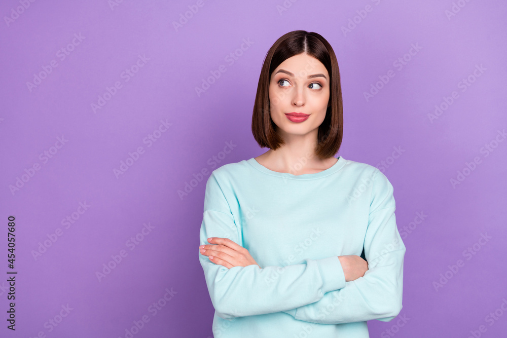 Photo portrait girl smiling confident with folded hands looking copyspace isolated pastel violet color background Photo portrait girl smiling confident with folded hands looking copyspace isolated pastel violet color background