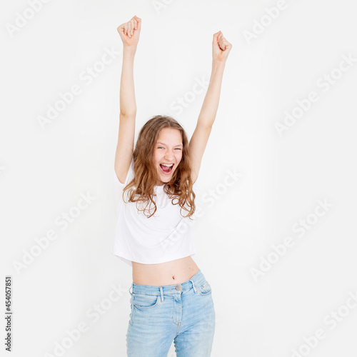 Happy teen girl in white t-shirt