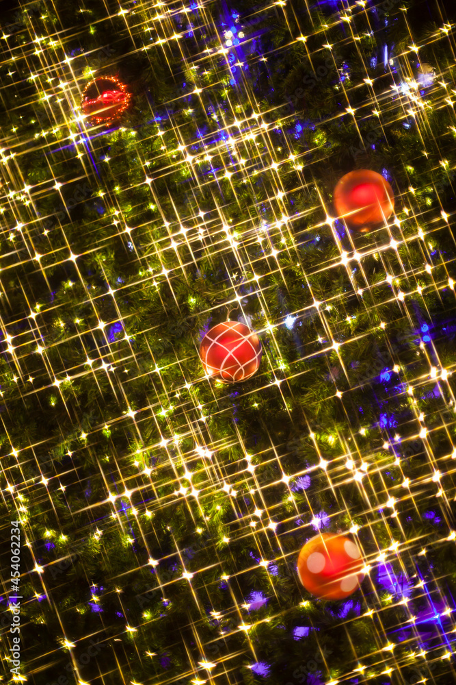 Christmas Tree decorations lit background