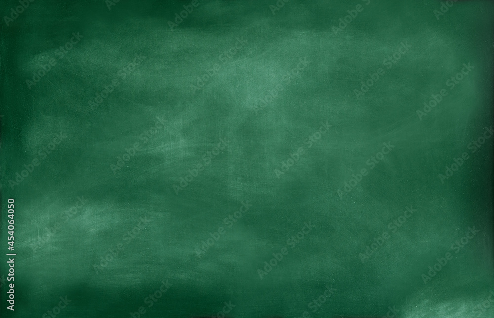 A dirty green chalk board.Texture or background