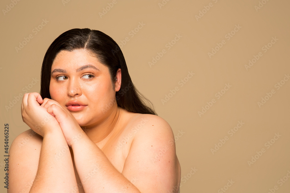Studio portrait of shirtless young woman Studio portrait of shirtless young woman