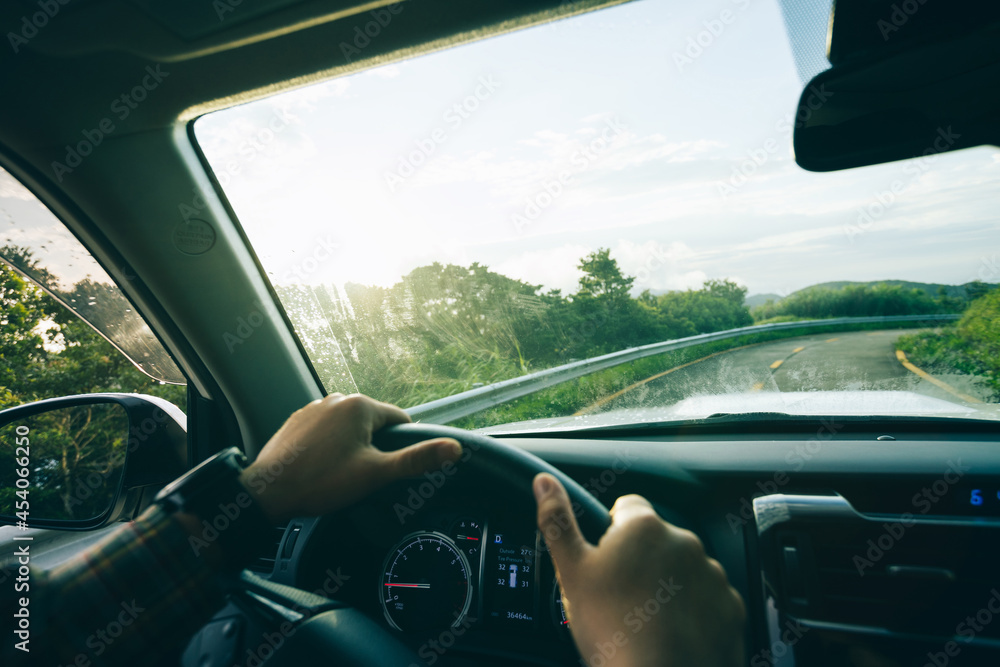 People driving car on mountain road