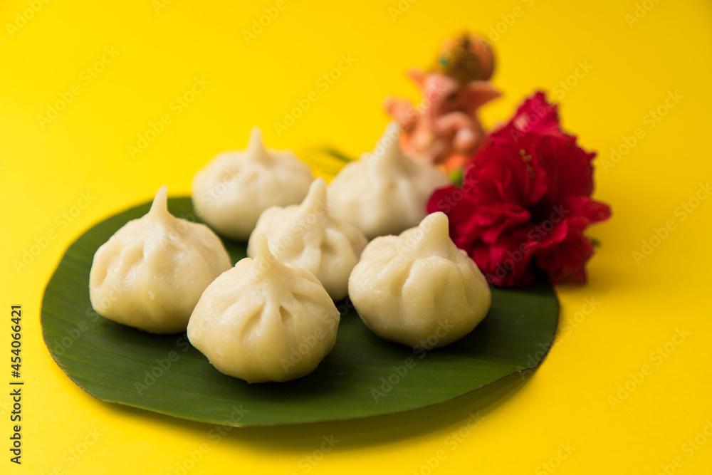 Modak, an Indian sweet made during Ganeshotsav for lord Ganesha. Modak, an Indian sweet made during Ganeshotsav for lord Ganesha.