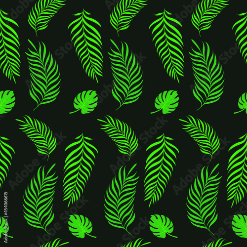 Seamless pattern with tropical leaves: palm and monstera. Black background. © Viktoriia
