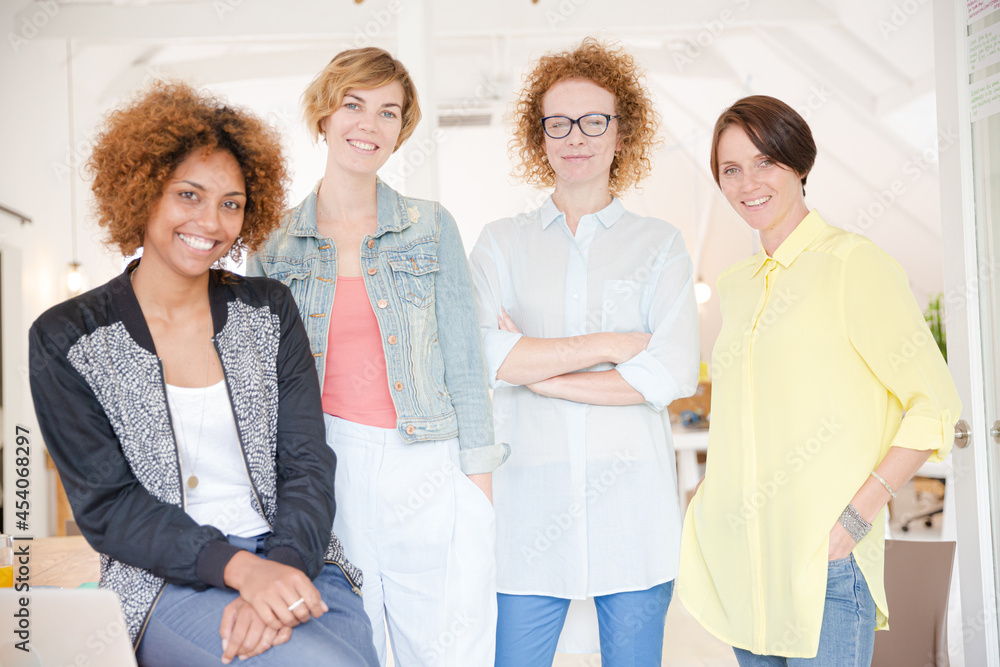 Group of smiling women at work Group of smiling women at work