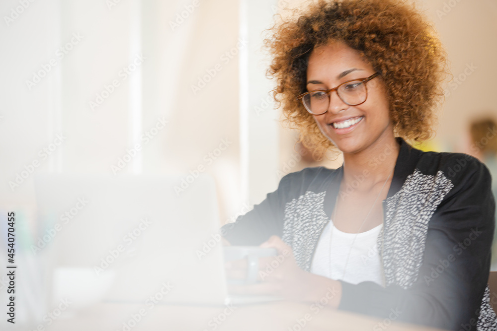 Office worker with coffee using laptop Office worker with coffee using laptop