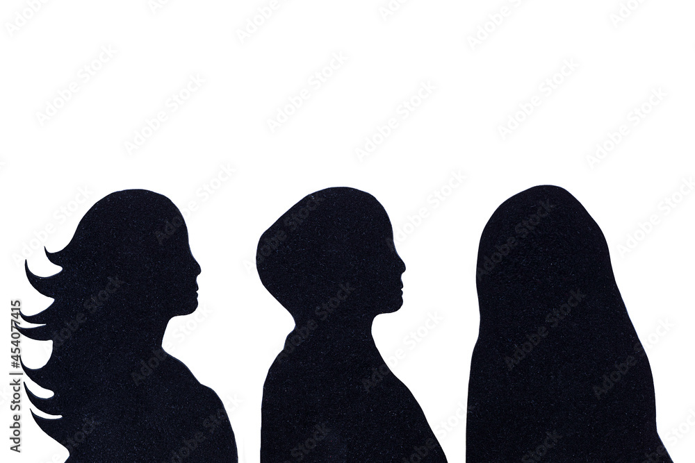 Black silhouettes of women, first one with long hear, second wears hijab covering her head and third wears burqua. Comparison of how cultural and religious aspects influence individuality of women. Black silhouettes of women, first one with long hear, second wears hijab covering her head and third wears burqua. Comparison of how cultural and religious aspects influence individuality of women.