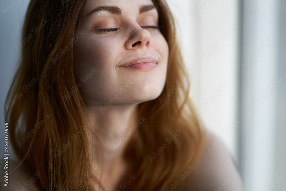 attractive red-haired woman near close-up lifestyle attractive red-haired woman near close-up lifestyle
