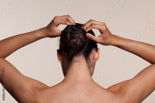 Woman touching hair
