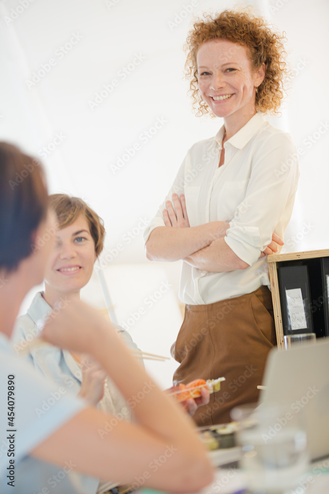 Fototapeta premium Office workers having lunch together