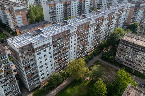 Above view of residential area in city. Multi-storey panel buildings. photo