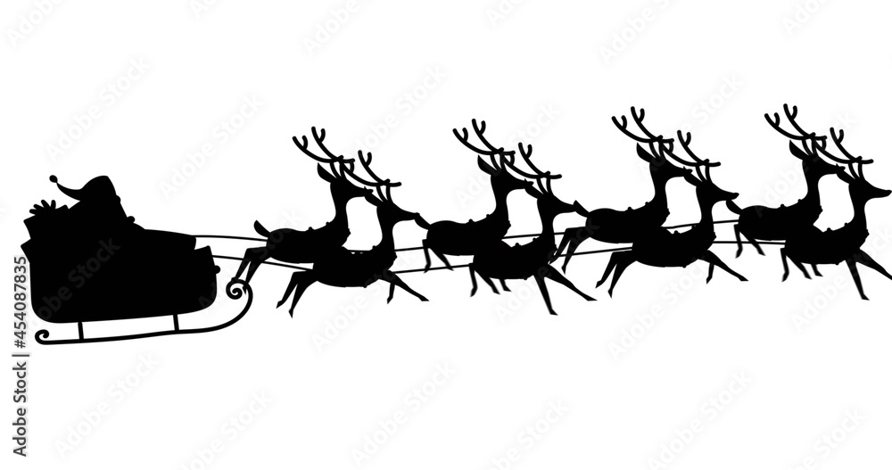 Digital image of black silhouette of santa claus in sleigh being pulled by reindeers