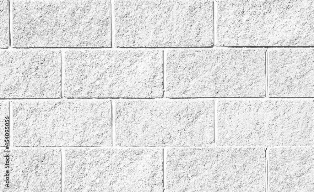 Naklejka premium Surface texture of white with gray blurred concrete wall, cement pattern with cracks background with space to copy