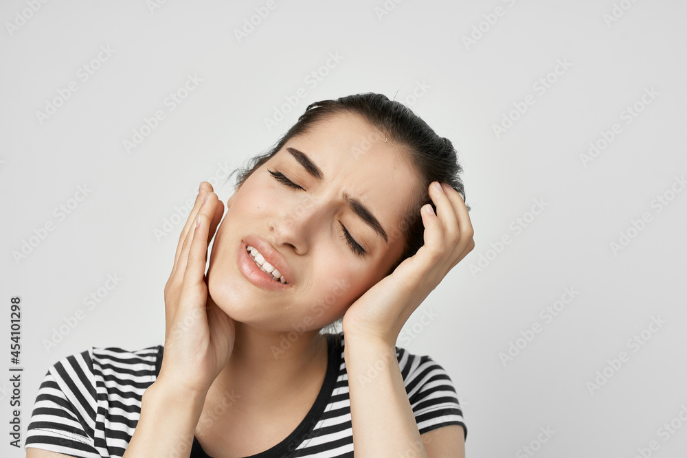 woman in striped t-shirt teeth pain emotions dentistry woman in striped t-shirt teeth pain emotions dentistry