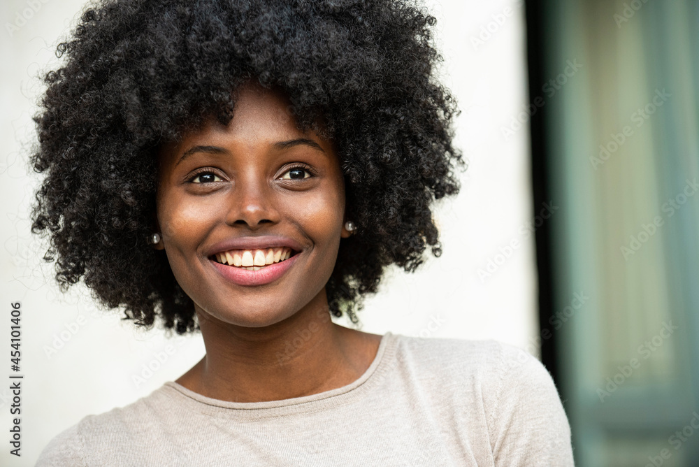 Portrait of smiling young woman in park Portrait of smiling young woman in park