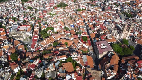 Taxco is a town in the state of Guerrero, famed for Spanish colonial architecture. Plaza Borda, the main square, is home to the landmark 18th-century Santa Prisca church, churrigueresque style. photo