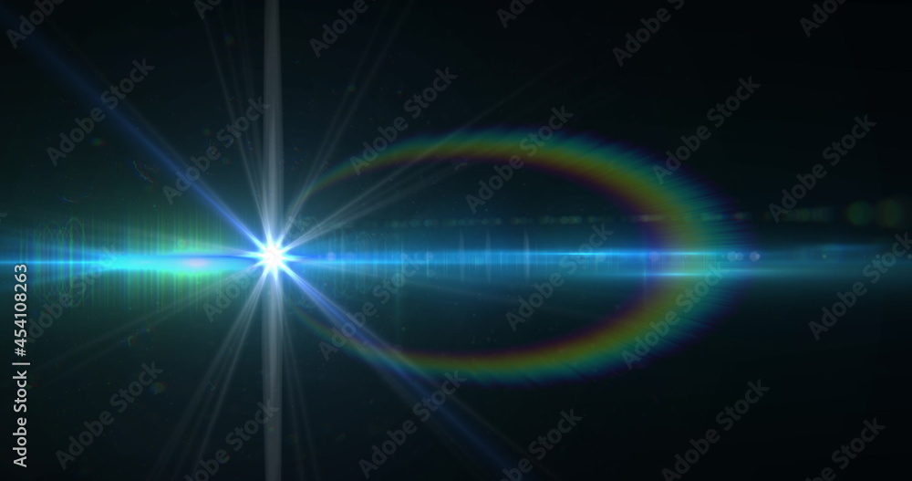 Spot of light and lens flare against black background Spot of light and lens flare against black background