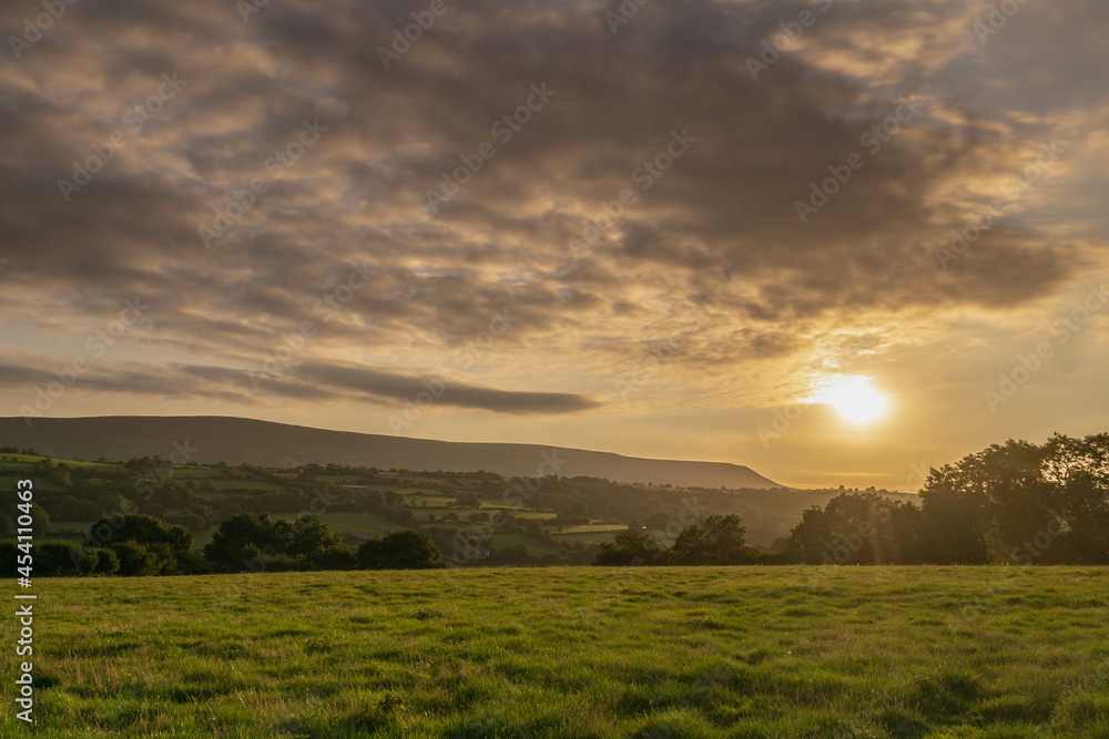 Sun setting over the english countryside in late August