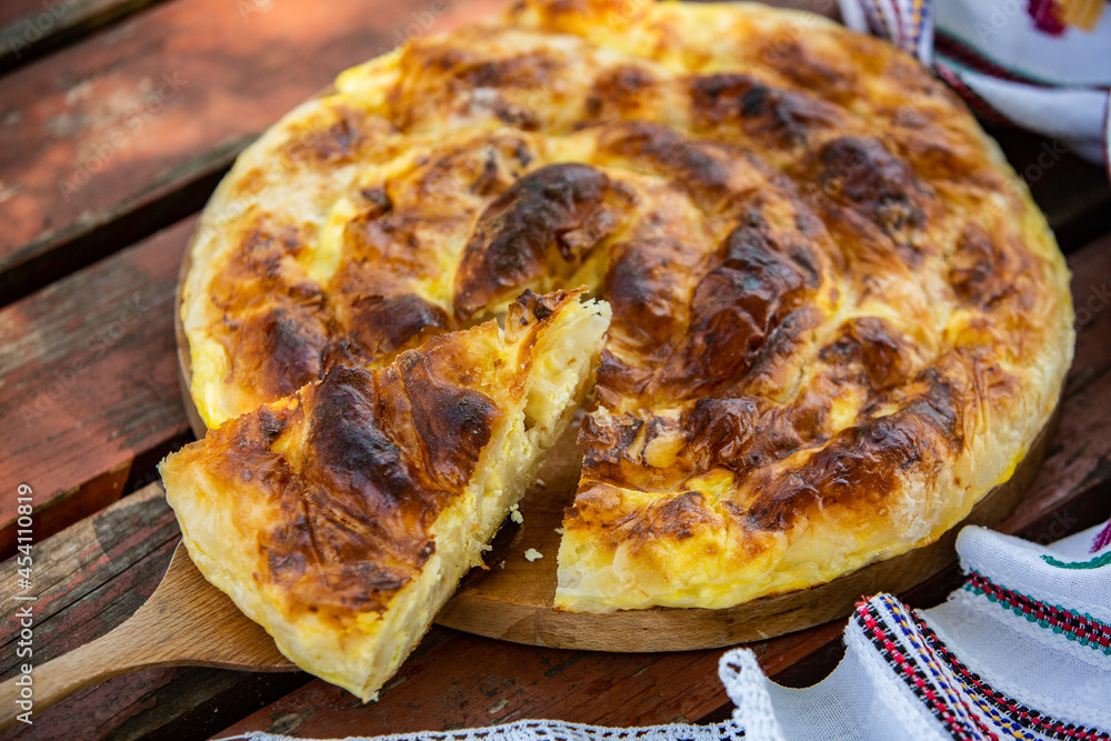 Traditional Romanian baked house pie with cheese Traditional Romanian baked house pie with cheese