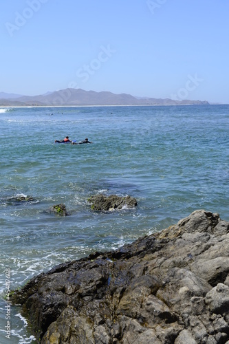 Vertical imaga of rocks and ocean waves at the pacific ocean near Todos Santos in the Baja peninsula at Baja california Sur, La Paz Todos Santos Mexico. LOS CERRITOS Beach 