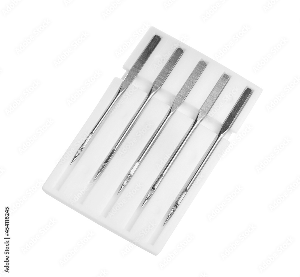 Set of metal needles for sewing machine on white background Set of metal needles for sewing machine on white background