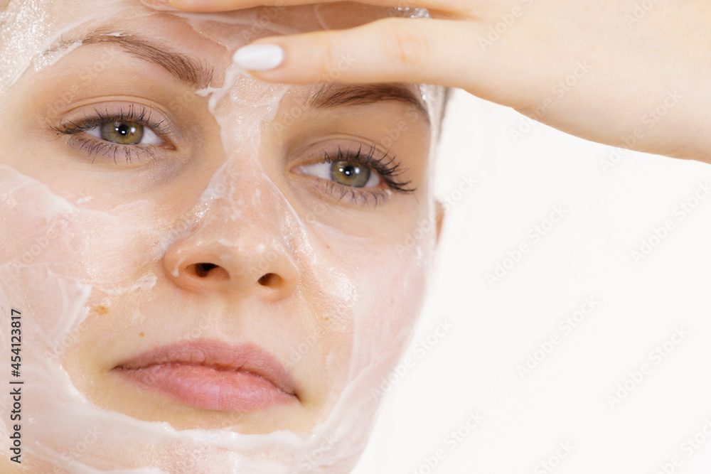Girl apply cream cosmetic