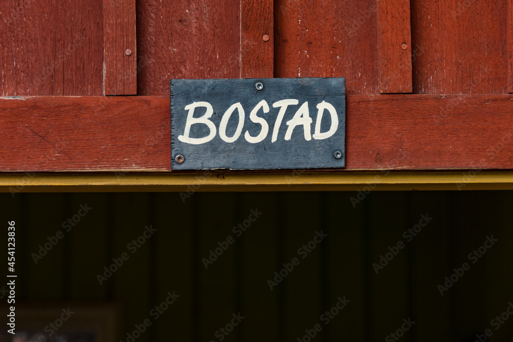Stockholm, Sweden A playground in the gentrified Kvarnholmen neighbourhood and sign on a small house says in Swedish: House Stockholm, Sweden A playground in the gentrified Kvarnholmen neighbourhood and sign on a small house says in Swedish: House