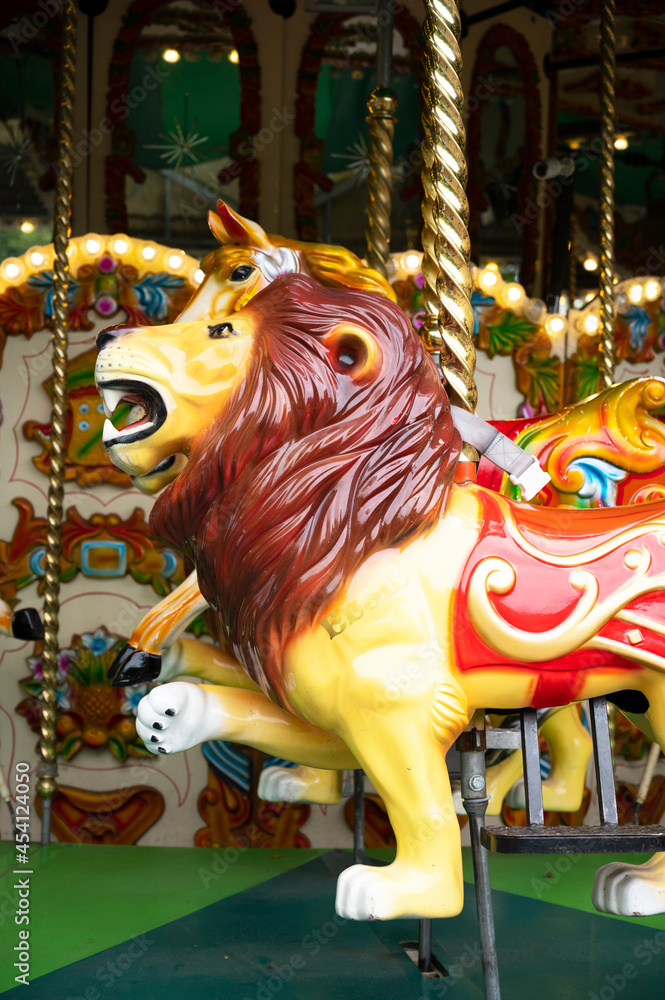London, U.K., July 22,2021: Carousel horse, having fun, merry go ride at London Zoo park