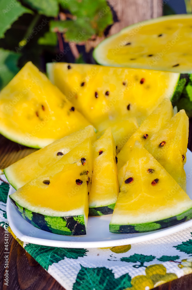 atermelon with yellow pulp on the table