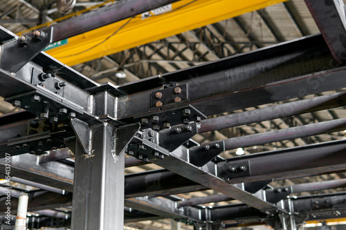 Obraz na plátně Connect joint plate and lock bolt of steel structure in construction work in fac