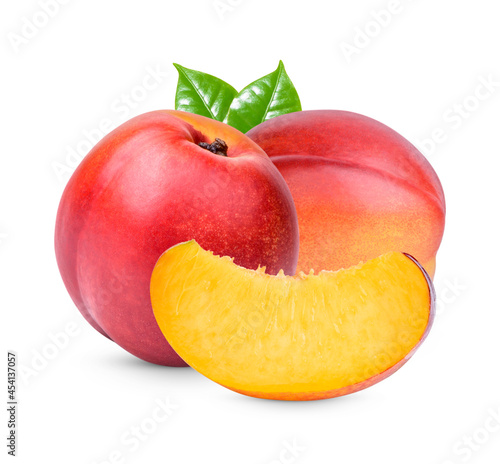 Nectarine with leaves isolated on white background