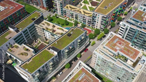 Buildings In Modern Housing Estate With Green Roof Covered With Vegetation