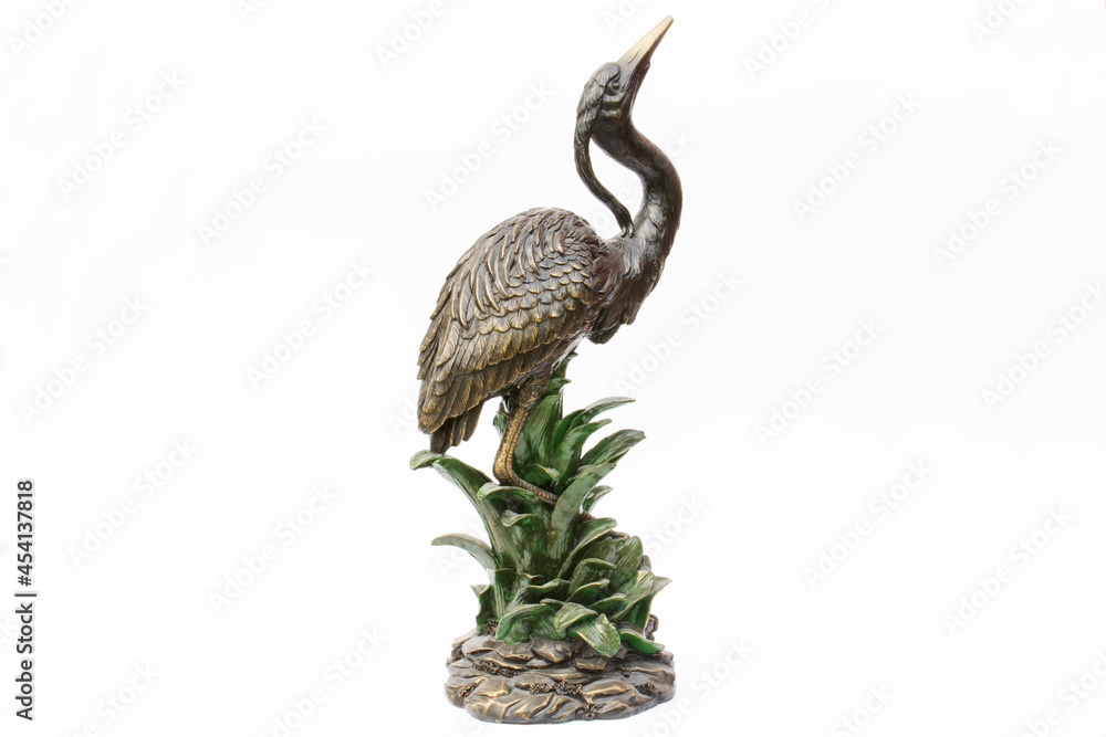 Fototapeta premium a blue heron statue designed for decorative purposes. isolated. White Background. 