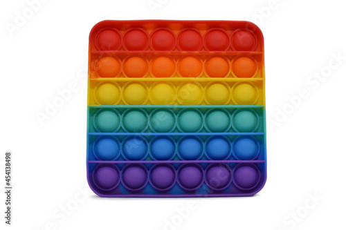 Simple Dimple Pop It colorful antistress toy. Sensory rainbow fidget silicone isolated on white background