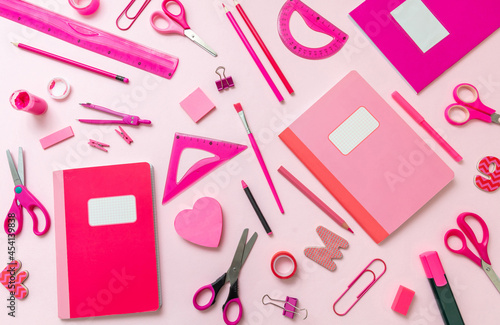 School supplies flat lay, stationery on pink background. Education, Back to School, kids creativity concept