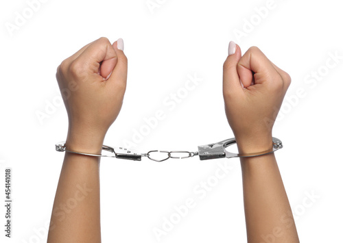 Woman in handcuffs on white background, closeup