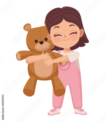 girl playing with teddy